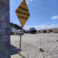 St Michael's Mount Harbour Power cable warning